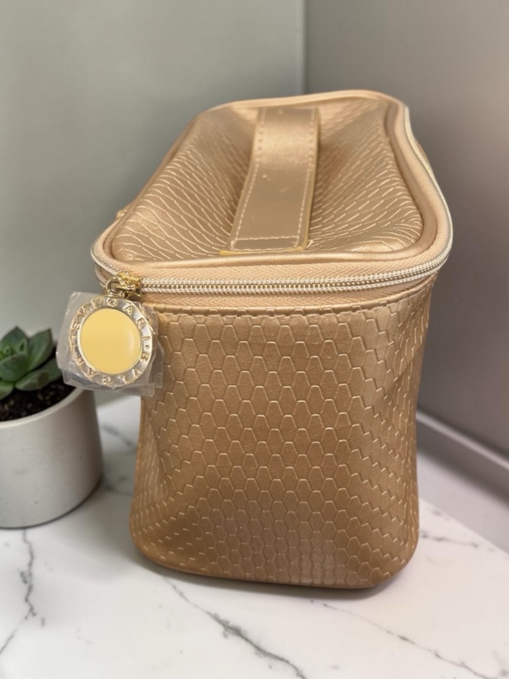 Bvlgari branded gold cosmetic makeup bag